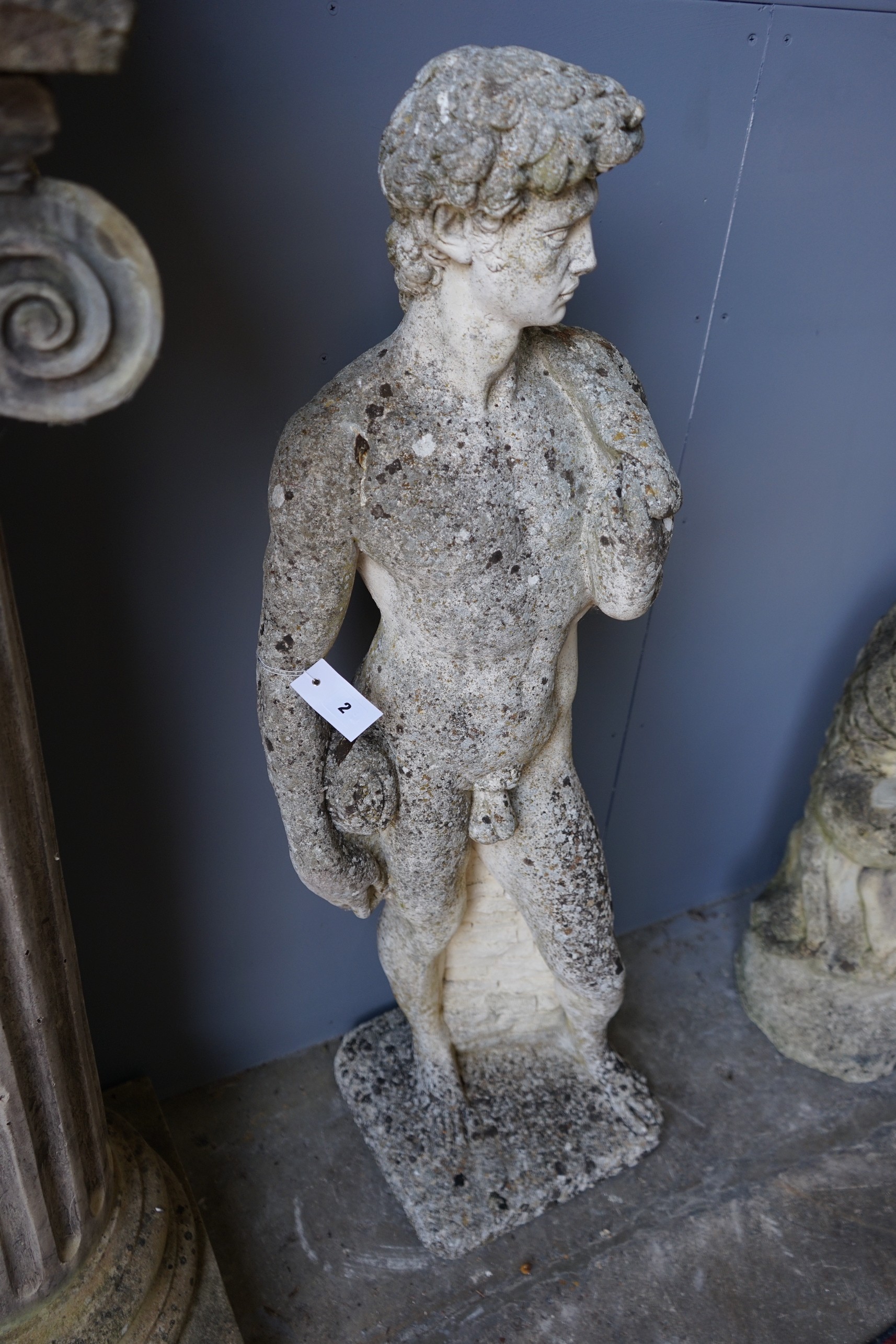 A reconstituted stone garden ornament of David, height 118cm